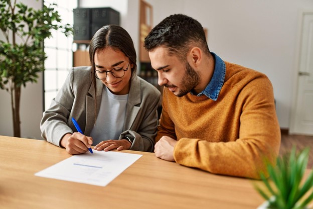 First time buyer sitting with lender.